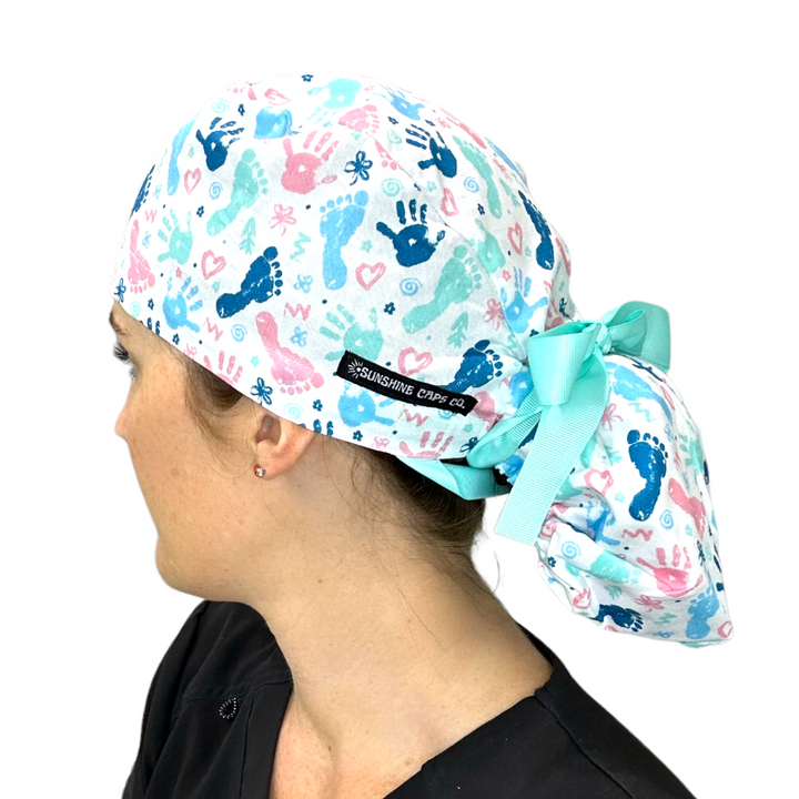 baby prints labor delivery Ponytail Scrub Cap for Women, By Sunshine Caps Co.
