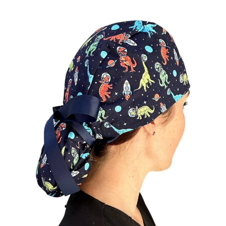 Space Dinosaur Ponytail Scrub Cap for Women, By Sunshine Caps Co.