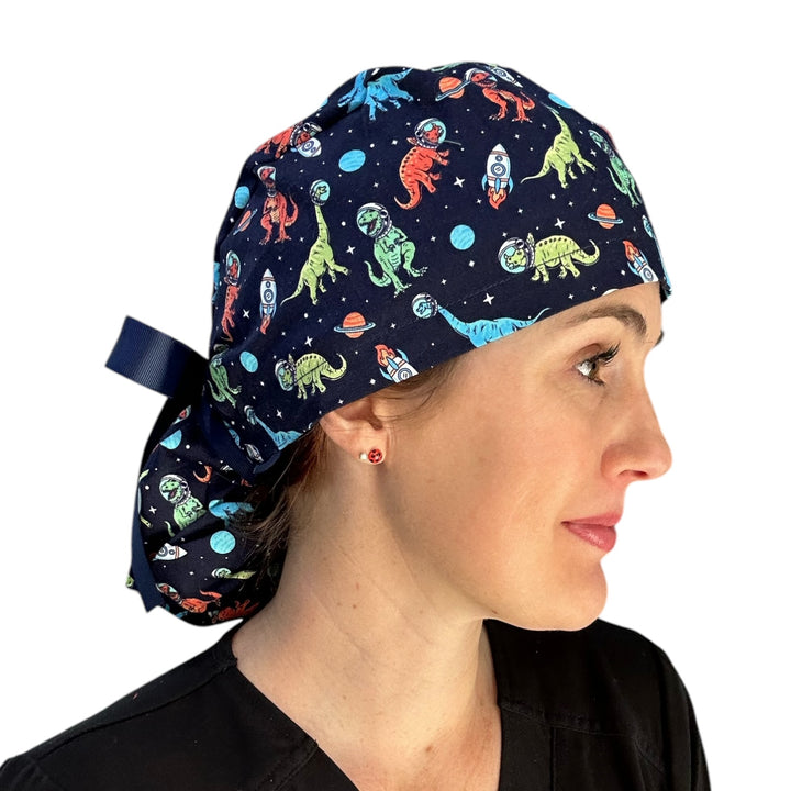Space Dinosaur Ponytail Scrub Cap for Women, By Sunshine Caps Co.