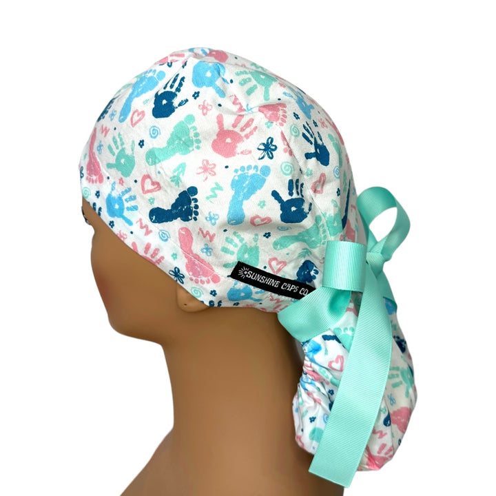 baby prints labor delivery Ponytail Scrub Cap for Women, By Sunshine Caps Co.